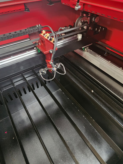 Interior view of R960 Laser Machine 100W RECI W2 showing the laser head and work area.