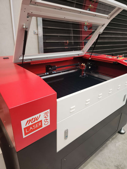 R960 Laser Machine 100W RECI W2 with open lid showcasing the laser system and work area.