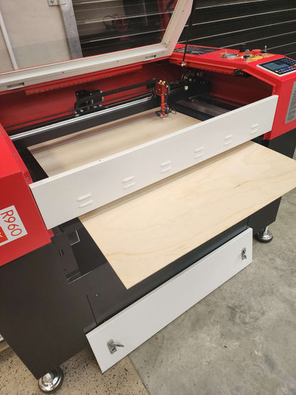 R960 Laser Machine 100W RECI W2 with open compartment displaying a plywood sheet inside.
