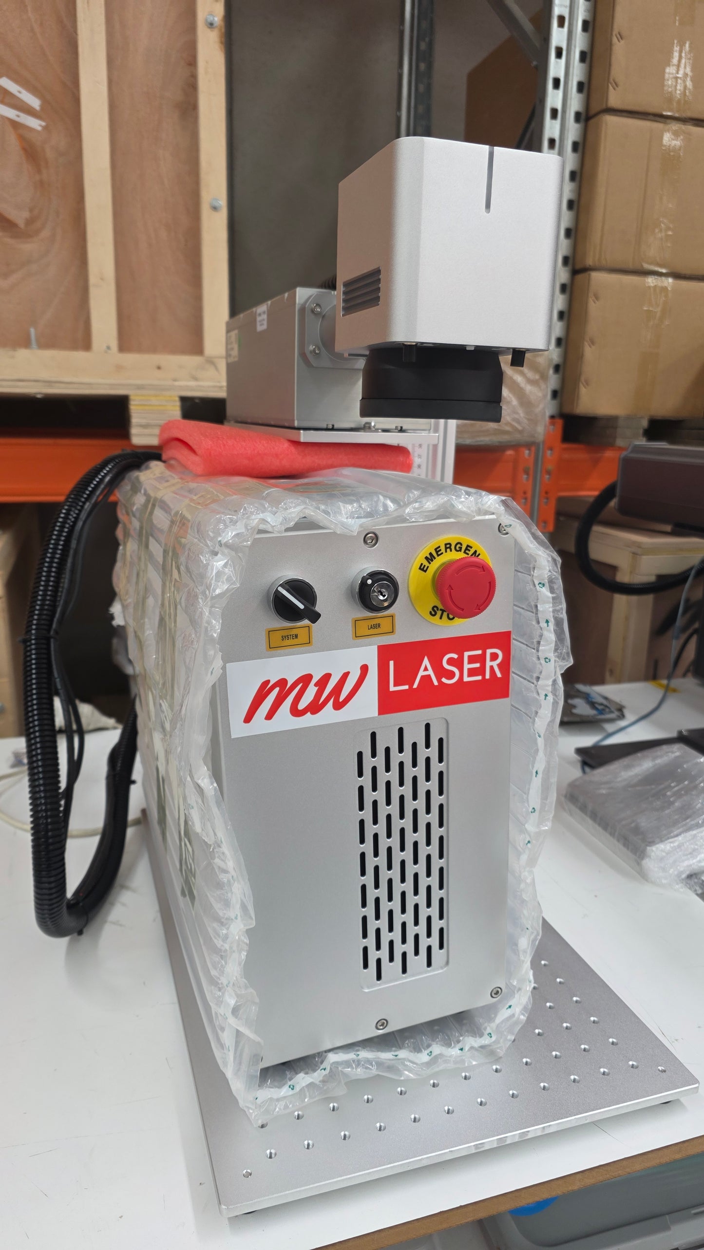 UV Laser Marking Machine RM-UV10X with user controls and safety features on a workstation.