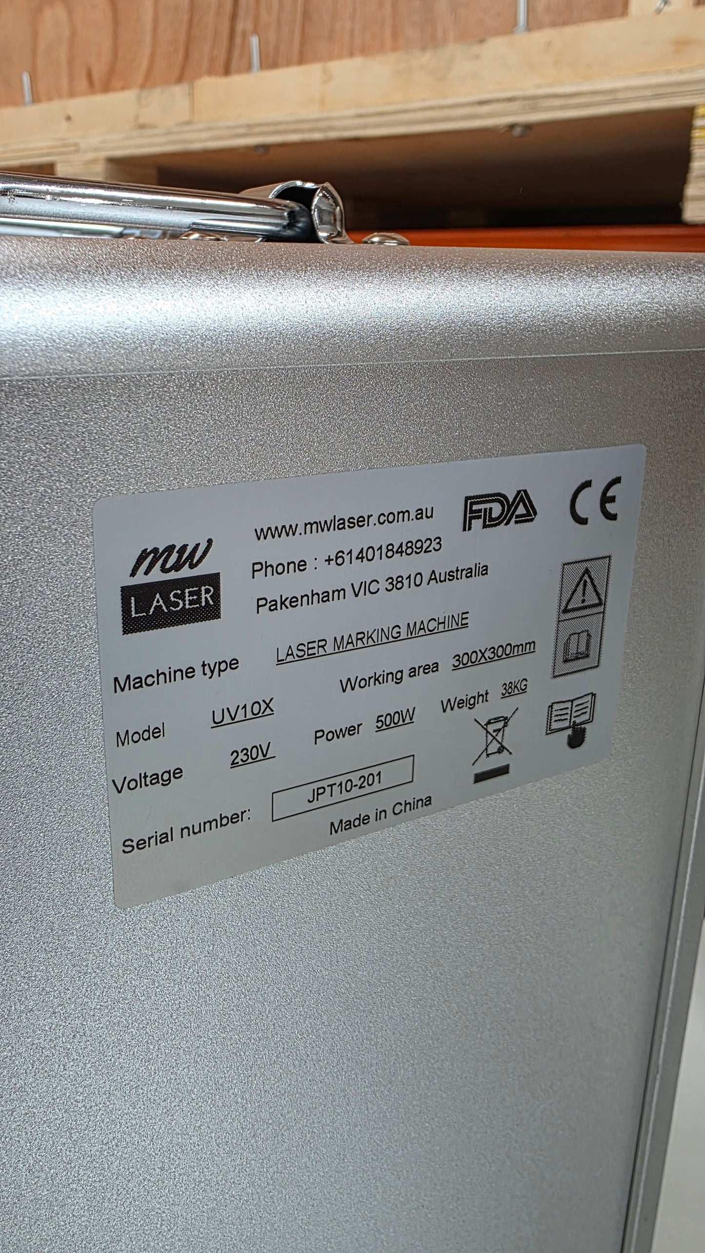 Label of the UV Laser Marking Machine RM-UV10X, showing model, specifications, and certification details.