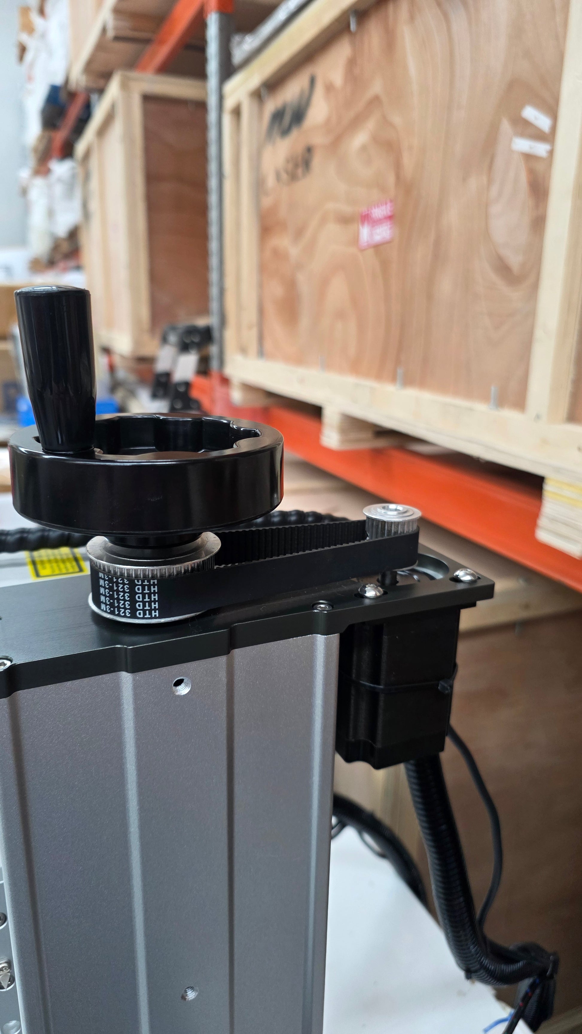 Close-up of the UV Laser Marking Machine RM-UV10X, showcasing the adjustment knob and precision components.